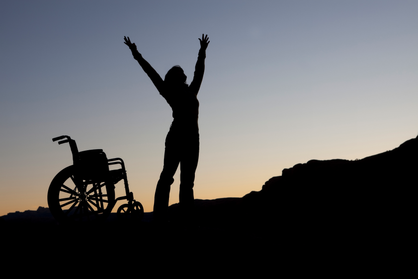 Woman Standing from Wheel Chair